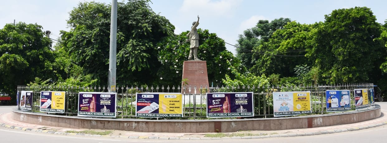 Voter awareness campaign material placed at intersections