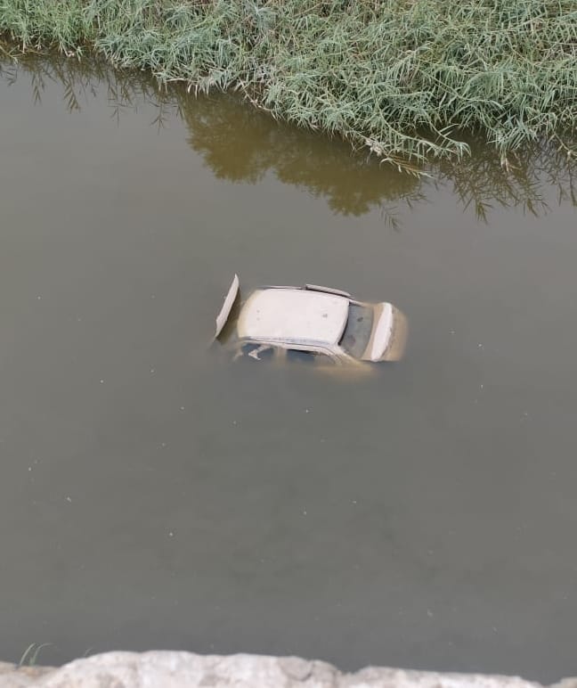 The body of a missing youth was found in a car submerged in a drain near KMP