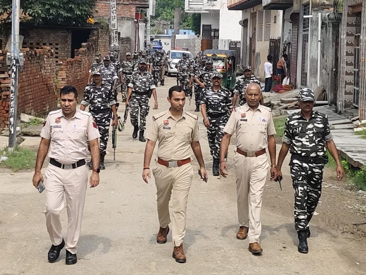 Paramilitary force took out flag march