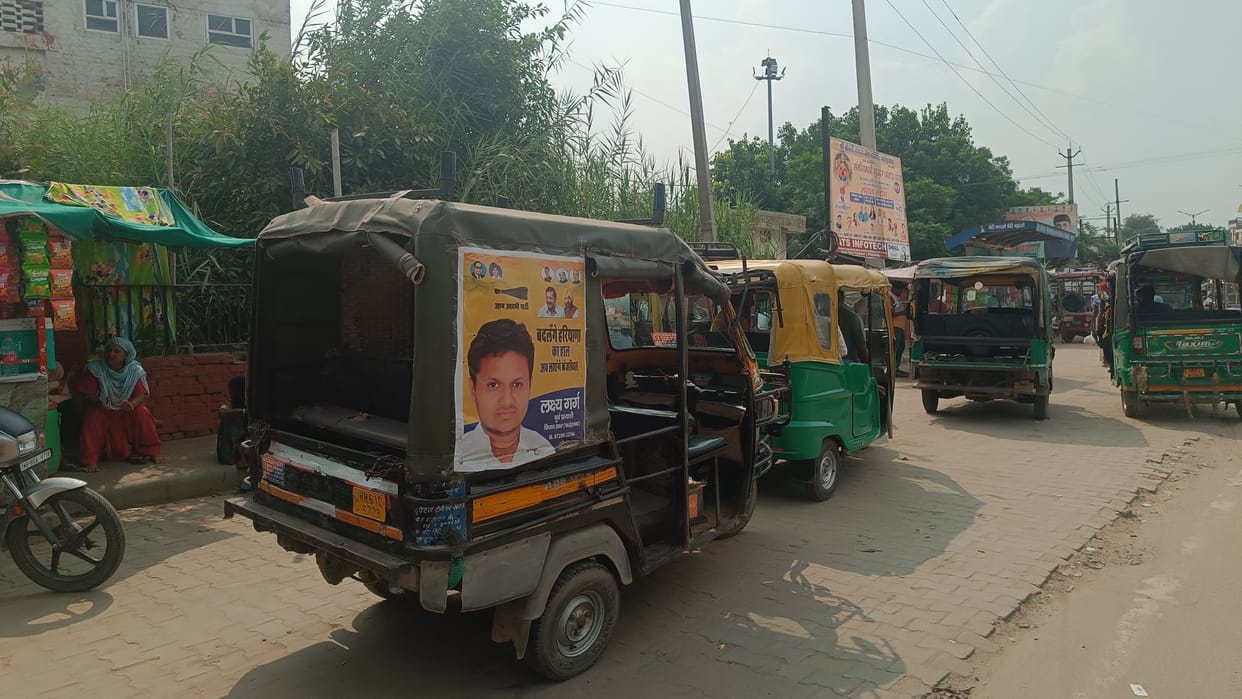 Open violation of code of conduct, political banners on autos