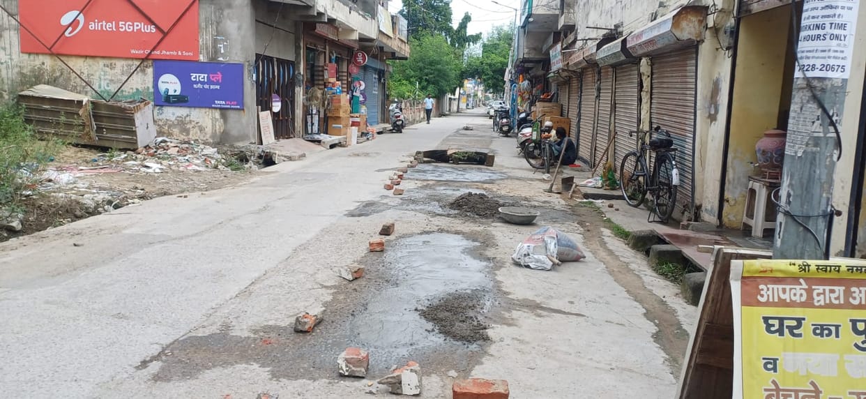 Broken roads were repaired with patchwork and bricks