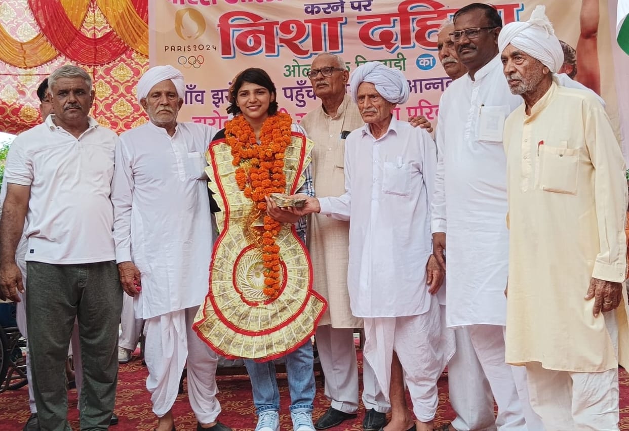 Olympian Nisha Dahiya was honored in village Jharoth