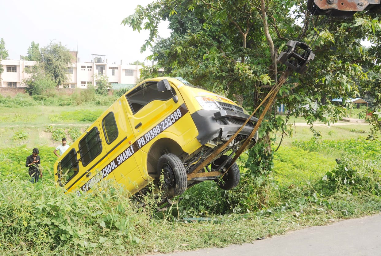 School van overturns in ditch on canal tracks, four students injured