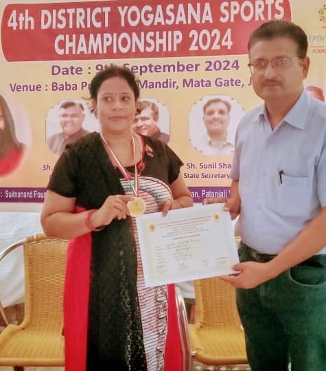 Teacher won gold medal in yoga competition