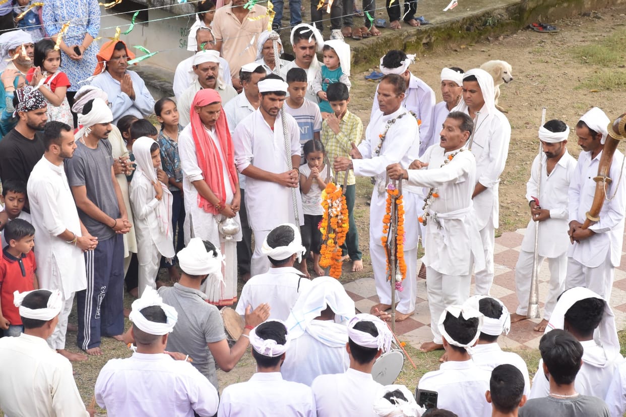 Residents of Chuwadi witness the meeting of two snake brothers