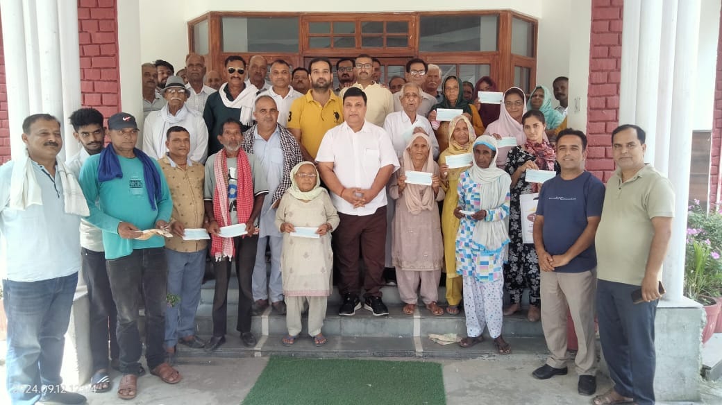 MLA distributed checks worth Rs 30 lakh to flood affected families