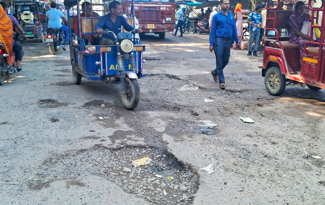 Life in danger... 107 potholes on 500 meter main road