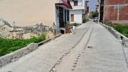 Construction of drain-interlocking roads in Sikandrarao