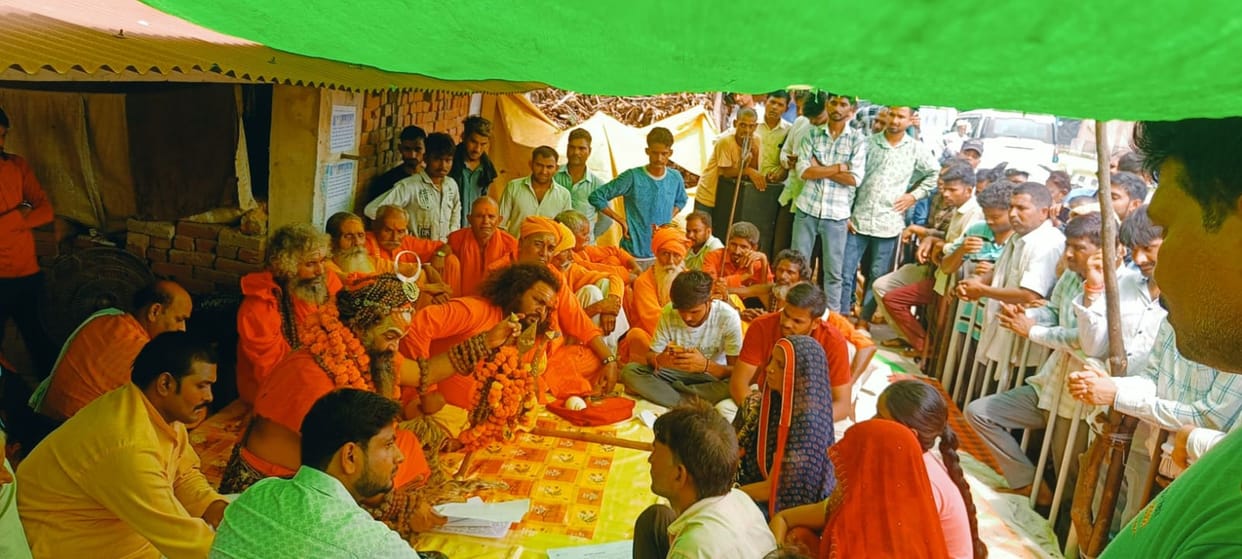 Mouni Maharaj sitting on strike with the victim's family