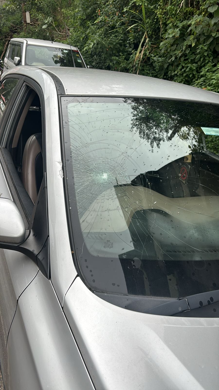 Driver door of moving bus opened, glass of car broken
