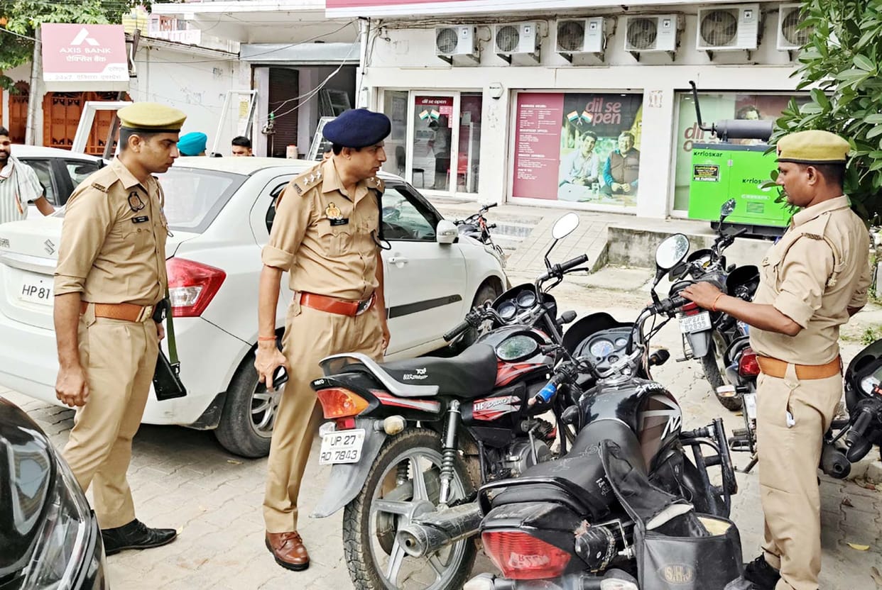 Take action against those standing unnecessarily outside banks
