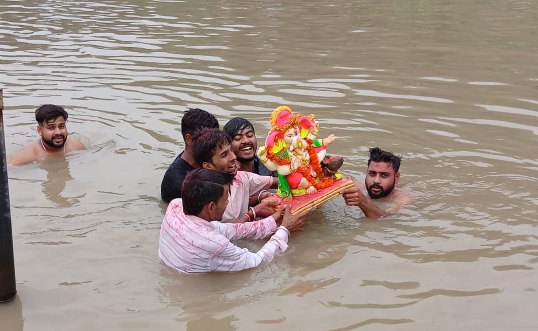 Idols of Lord Ganesha immersed with cheers