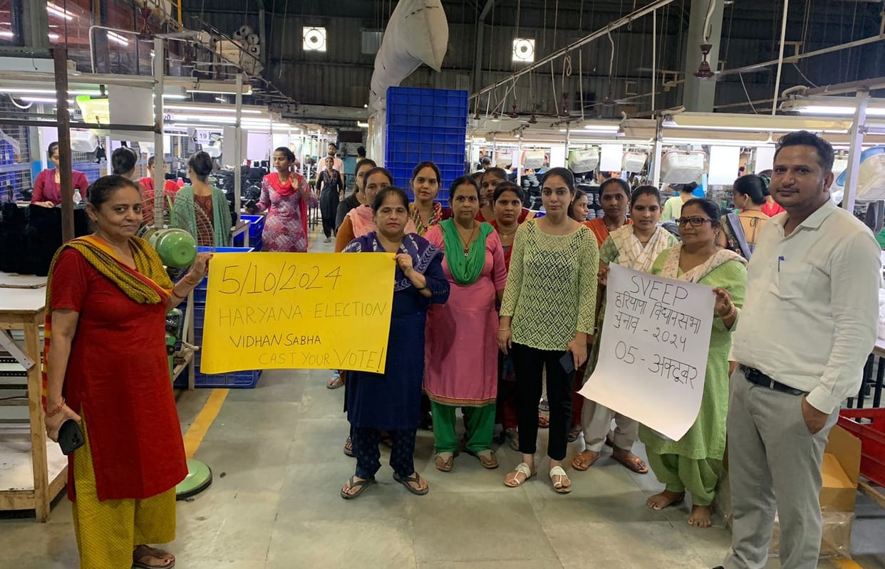 Voting awareness oath administered to workers