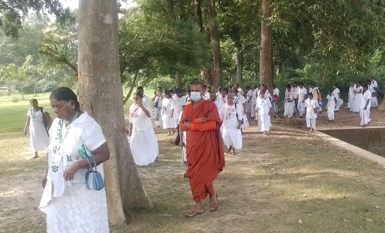 Buddhist shrine buzzing with followers