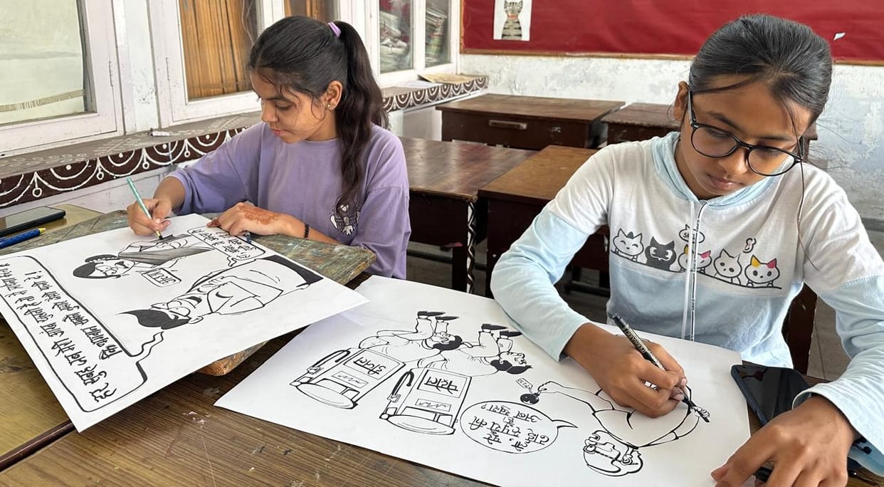 Tanu first in cartoon making competition