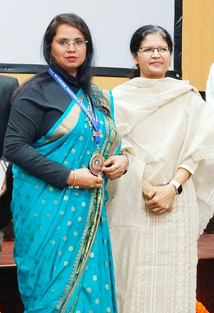 Monica received Sanskrit Teacher Ratna Award