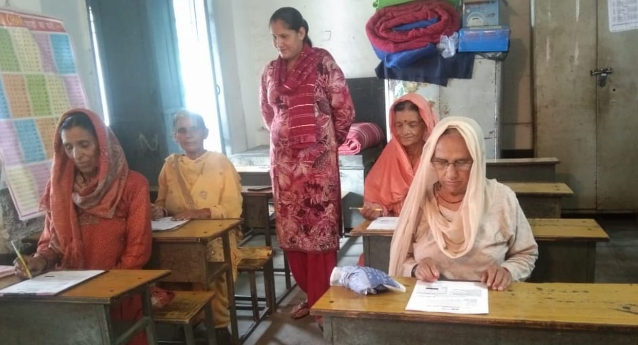 2444 people from illiterate to literate took the exam in the district.