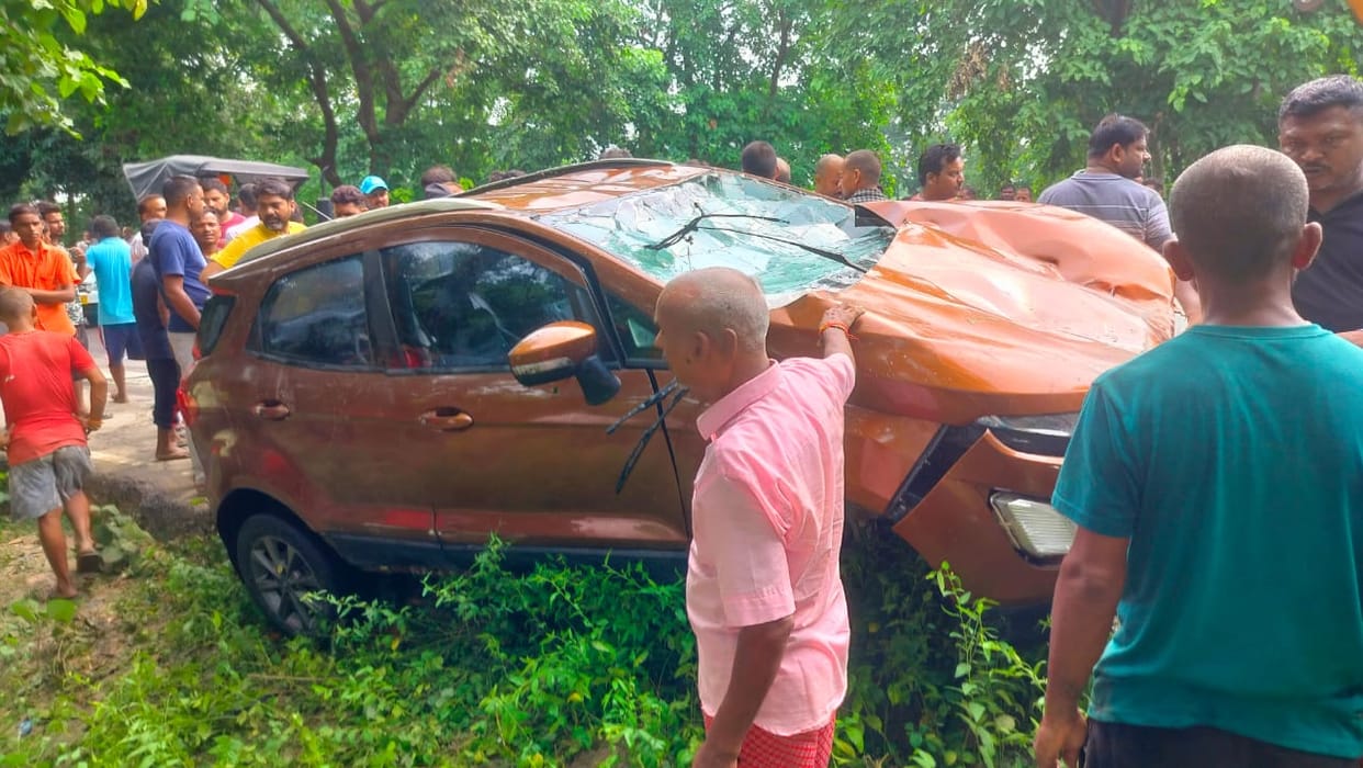 Car went out of control and fell into a pond