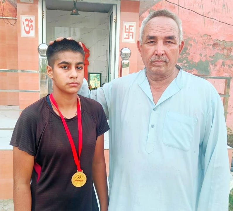 Nisha won gold in the state level wrestling competition
