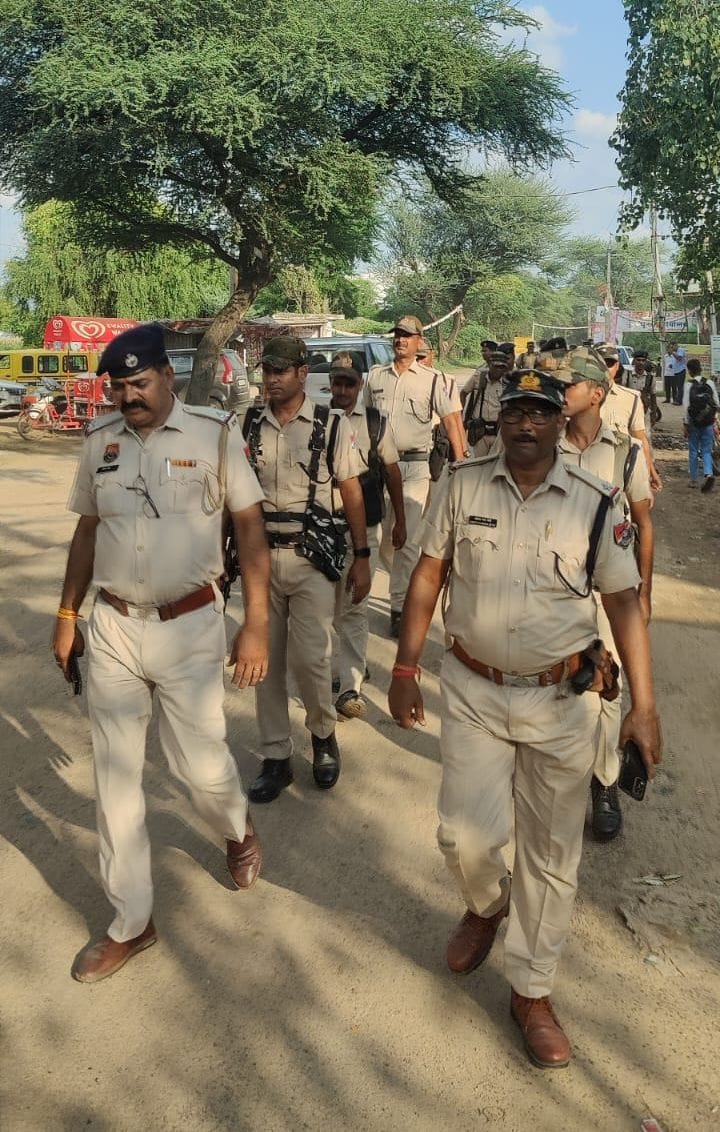 Police and RPF personnel took out a flag march
