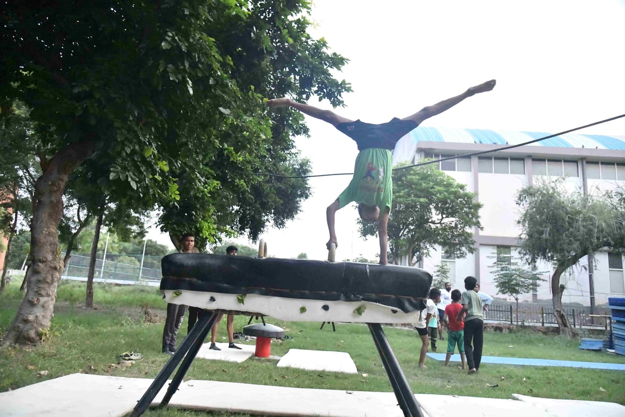 Players forced to practice gymnastics in the open on the wrestling mat, halls of Mahabir Stadium vacated due to elections