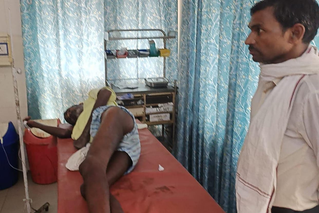 Bullet fired from firing range, hit the hip of a farmer cutting grass