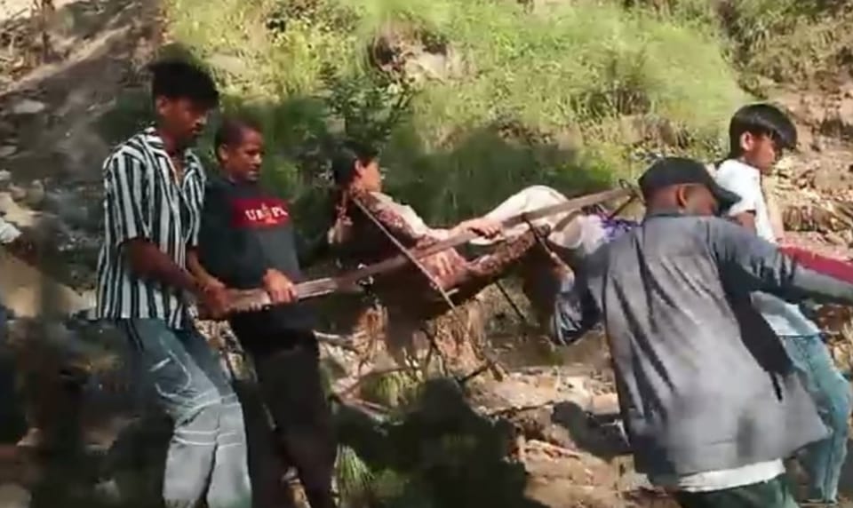 Villagers brought sick student by 10 km doli for treatment