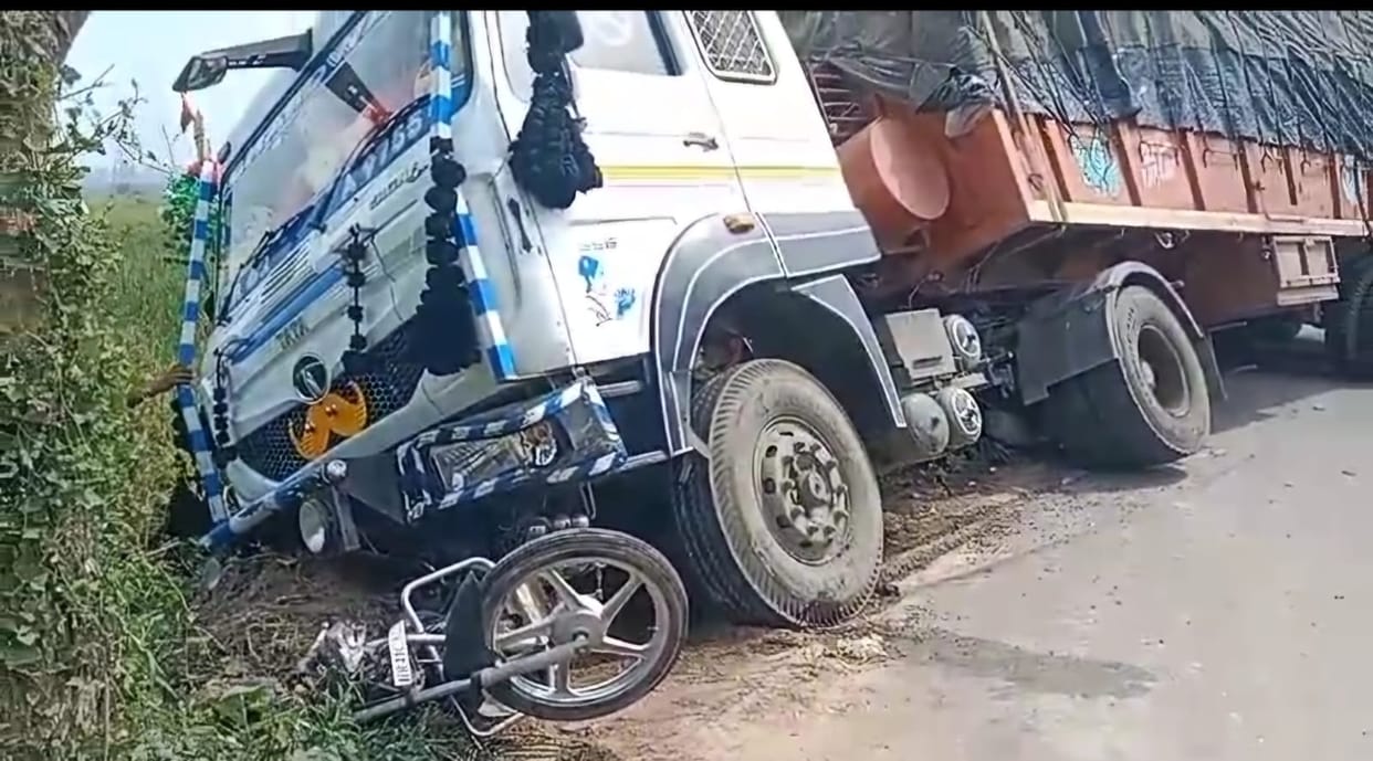 Truck hits bike rider, serious
