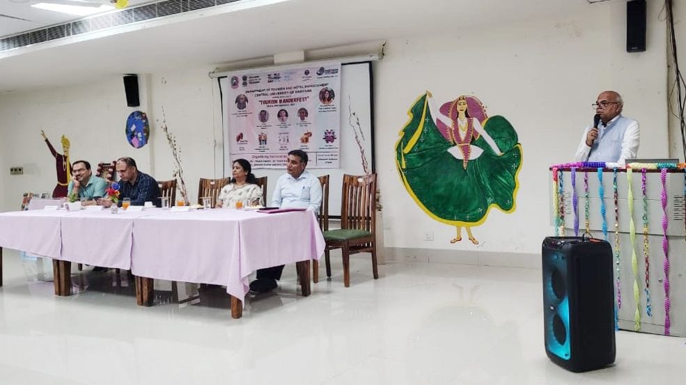 Importance of Hindi language told to students coming from adopted villages