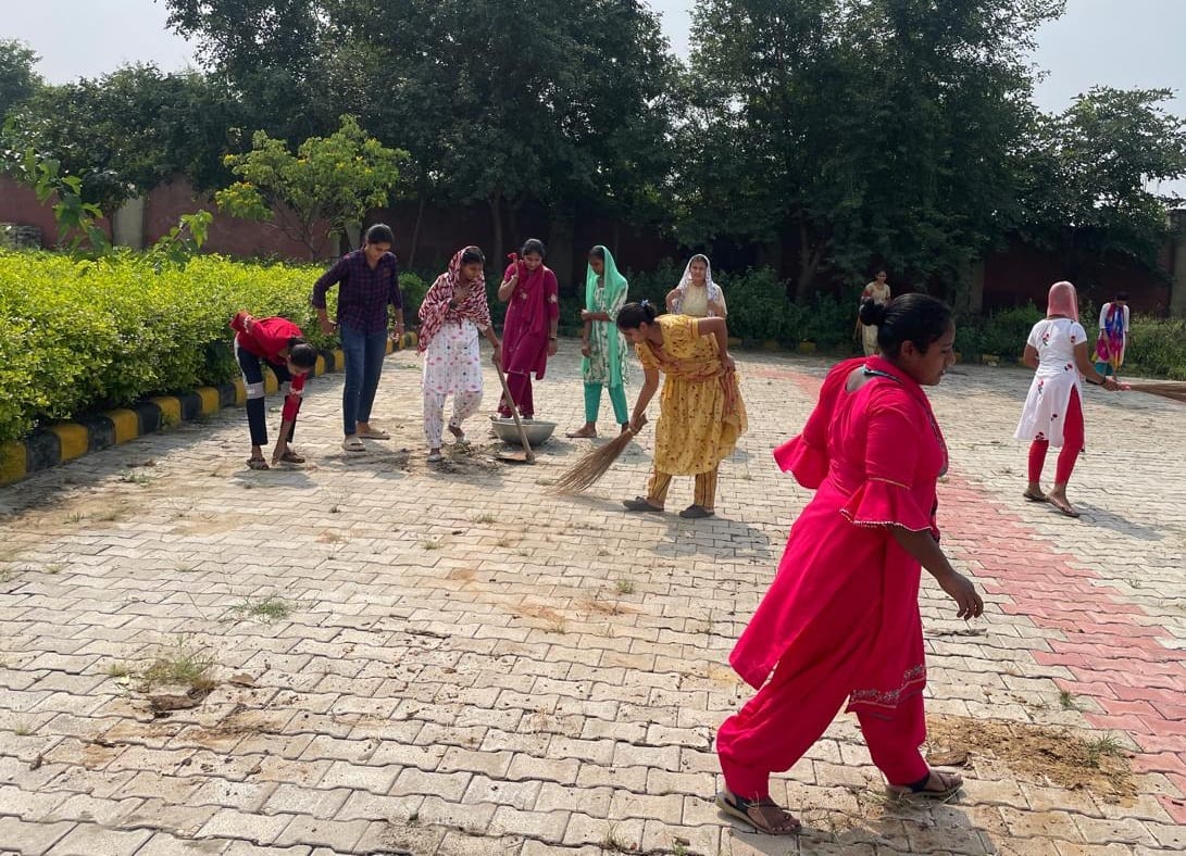 Motivated girl students to plant trees