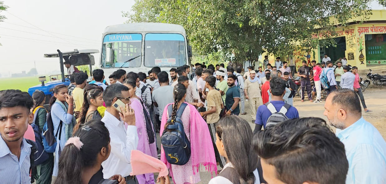 Angry students blocked bus for not stopping at village Rattakheda stop.