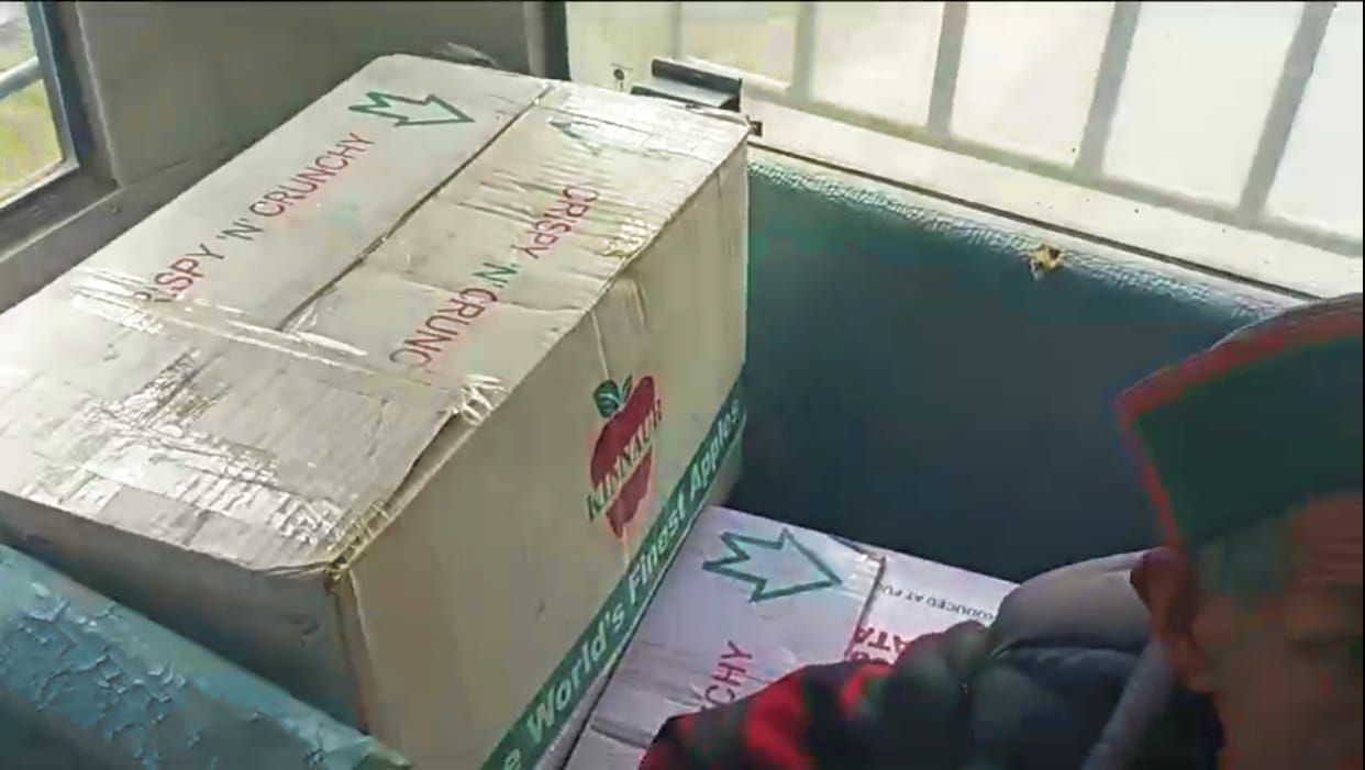 Apple boxes on bus seats, passengers worried