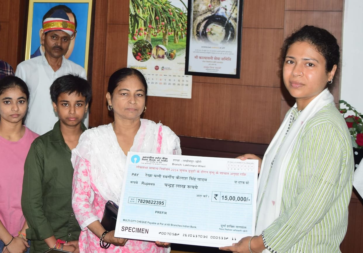 A check of Rs 15 lakh handed over to the dependents of the deceased accountant