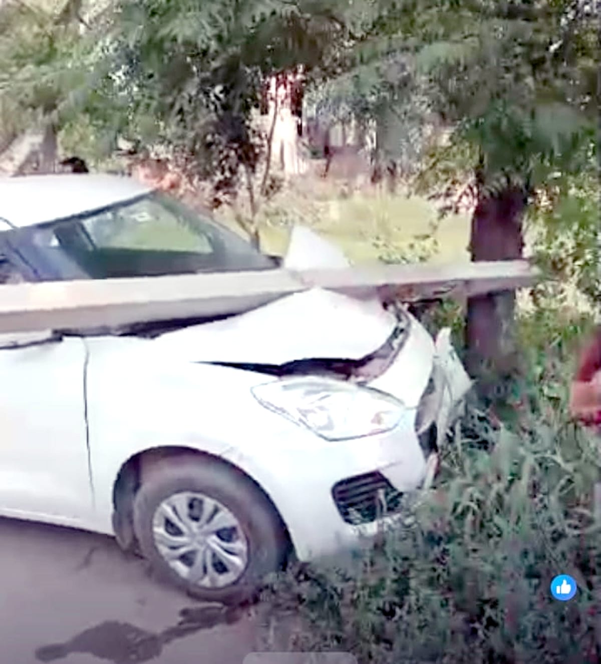 While trying to save a person, the car went out of control, the pillar broke and fell on the car