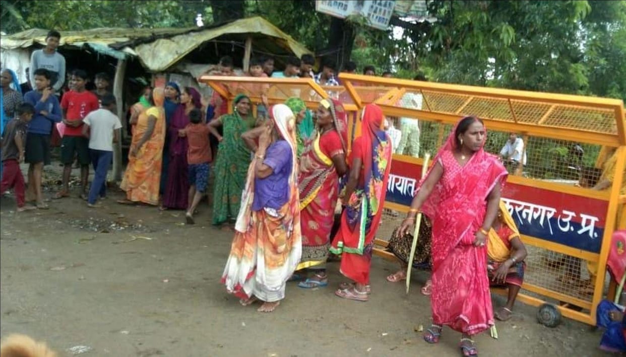 Angry women protested by blocking the road due to waterlogging