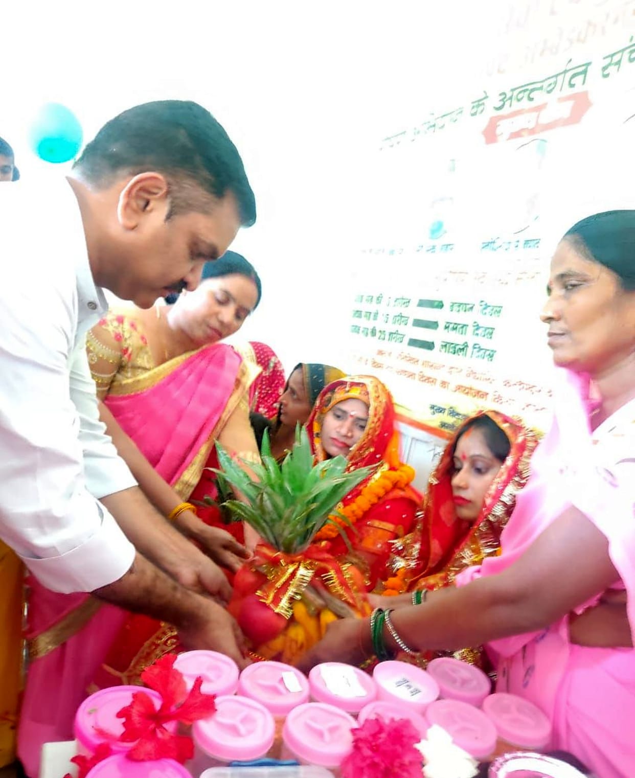 Minister handed over checks and citations to the beneficiaries