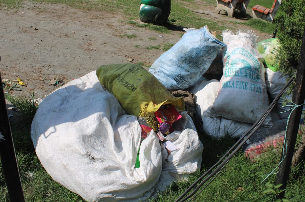 Piles of garbage on the roadside are testimony to cleanliness