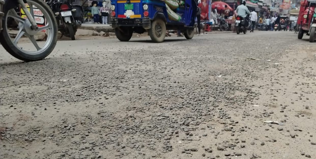 Patching in front and stones falling behind