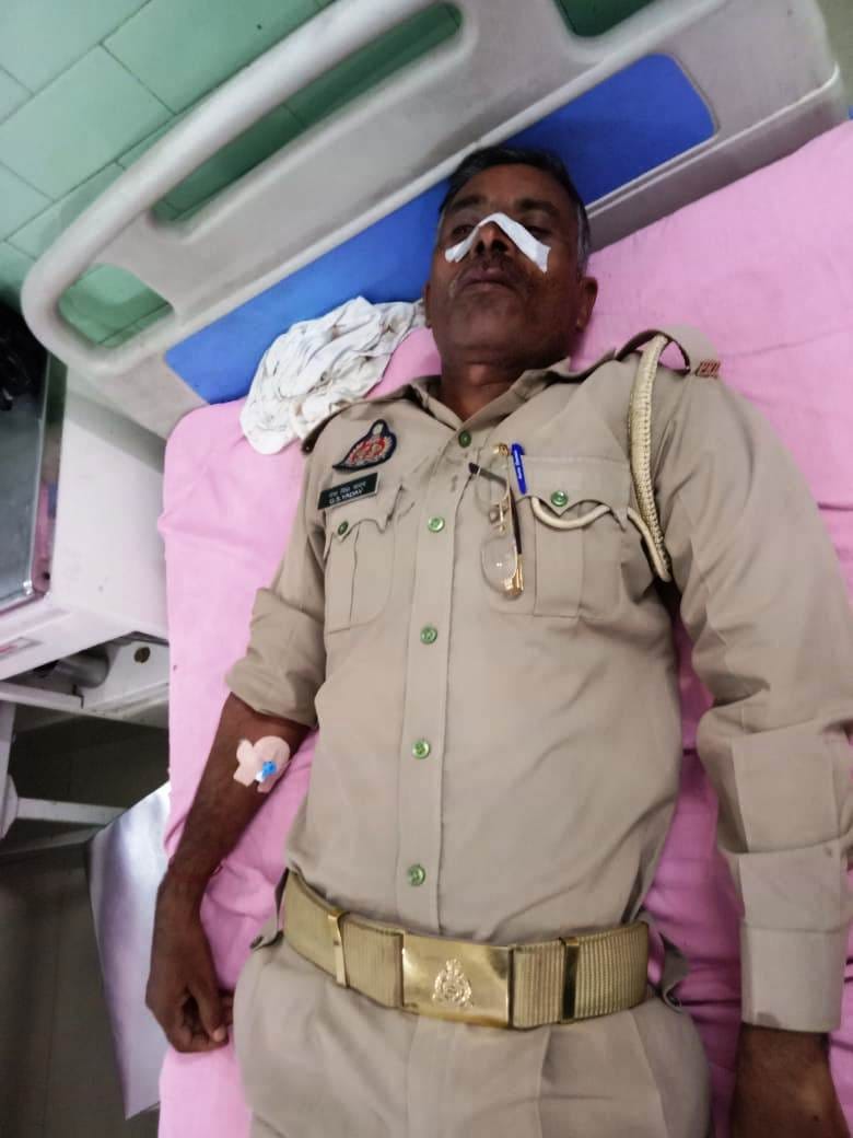 Two home guards returning home from duty got injured after colliding with a bull