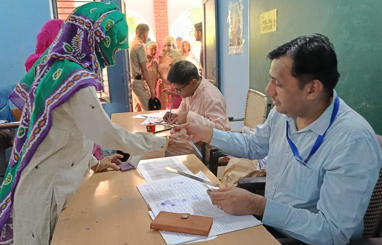 Woman's vote cast by unknown person, forced to cast it again due to ruckus