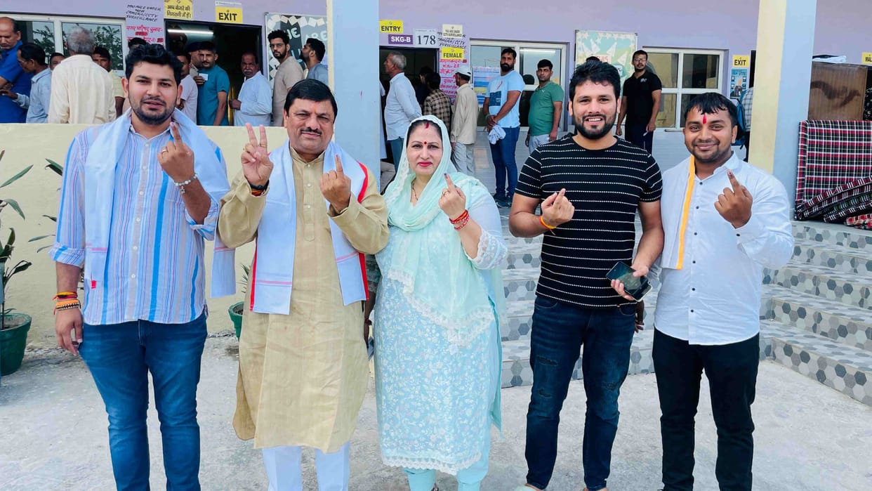 Candidates cast their votes with their families, claimed victory