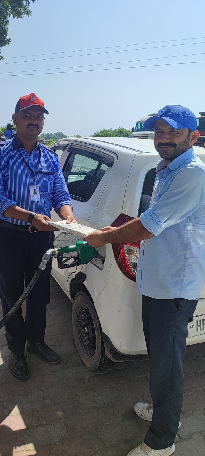 amar ujala news paper distributed in petrol pump