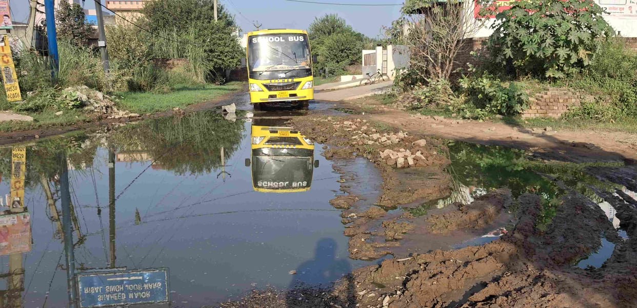 In Nuna Majra village, without rain, the roads remain filled with water.