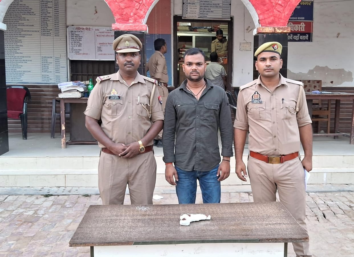Close associate of political leader arrested with pistol