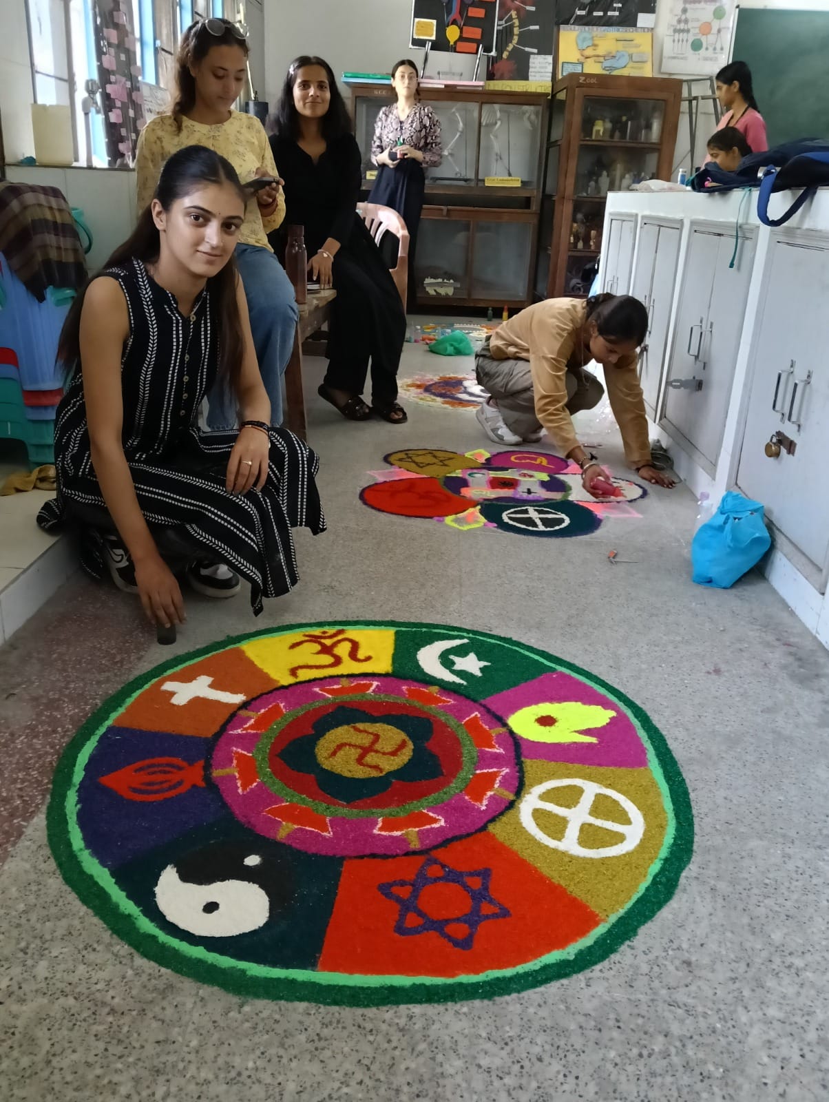 Tashi made the poster and Babita made the best rangoli.