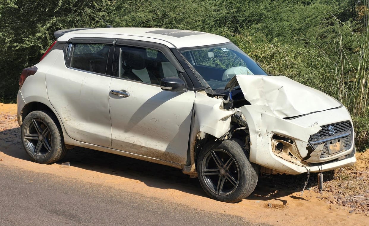 Collision between car and pickup in the valley of Madhogarh
