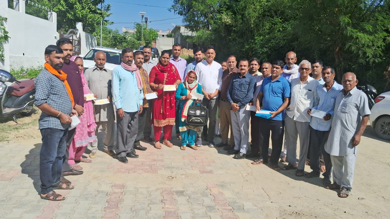 Checks distributed to needy families for weddings