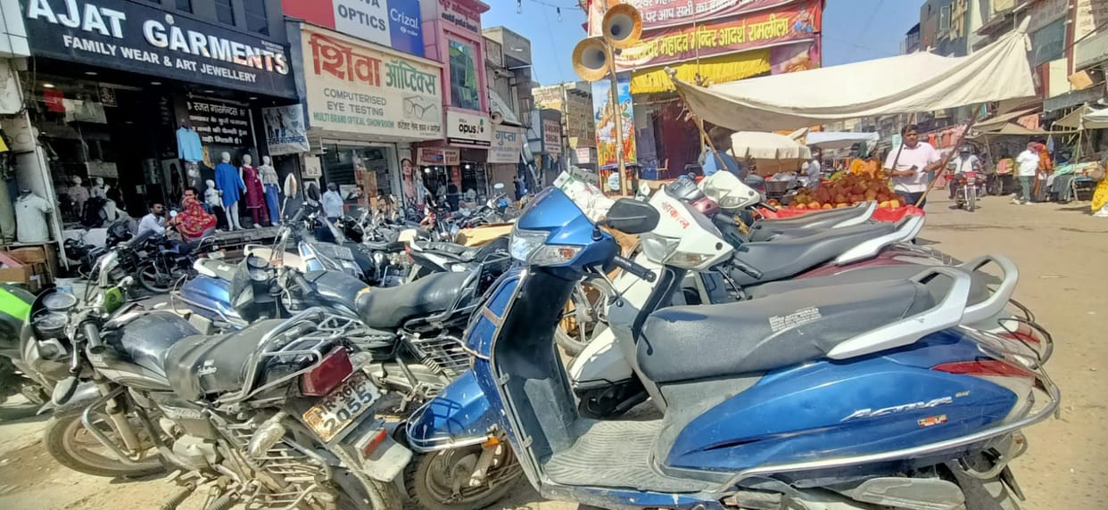 There is no parking in the city, there is traffic jam due to randomly parked vehicles.