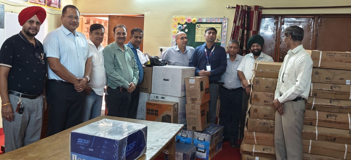 State Bank of India gave fans and computers to the school