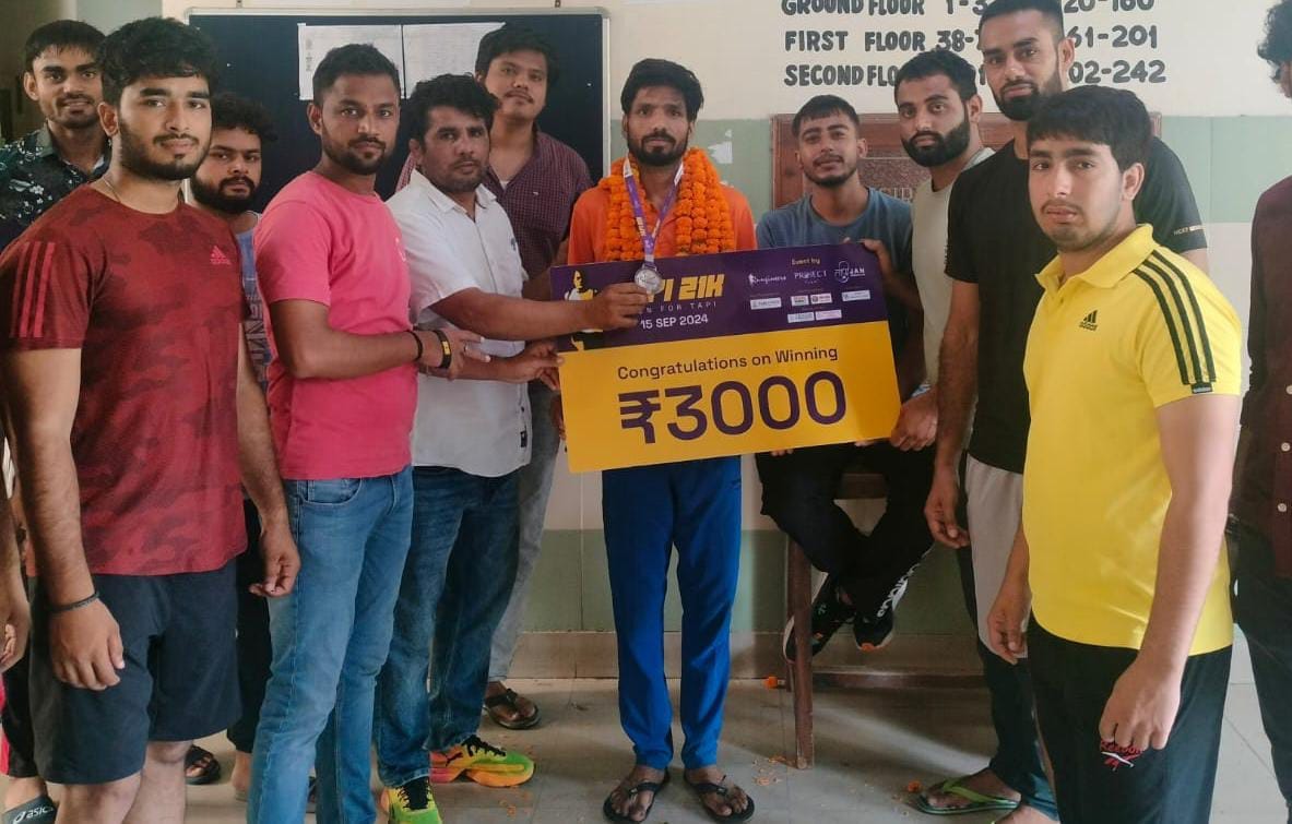 Pritam won bronze medal in 21 kilometer half marathon